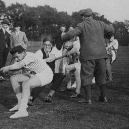 People taking part in tug of war News Article